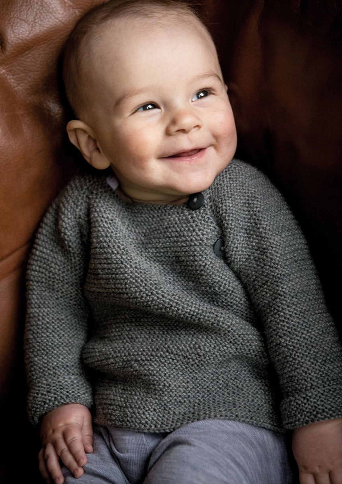Pullover mit seitlicher Knopfleiste