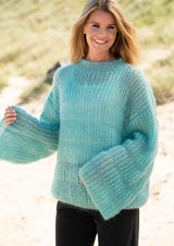 Lockerer Pullover mit Patentstreifen